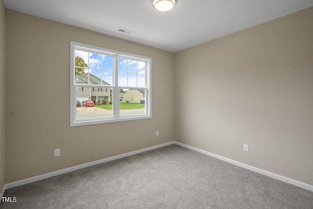 spare room with carpet flooring