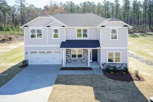 view of front of property with a garage