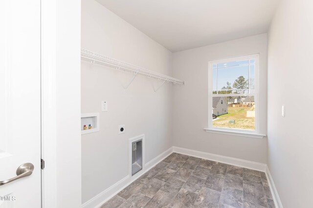 laundry area with hookup for a washing machine and hookup for an electric dryer