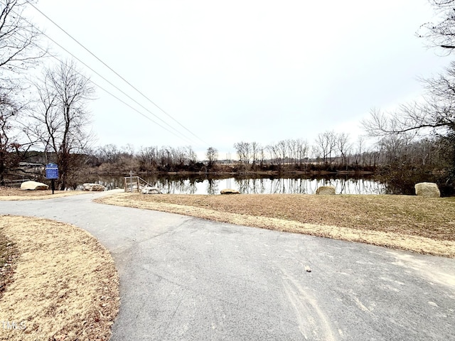 view of road featuring a water view