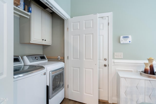 laundry area featuring cabinet space and independent washer and dryer