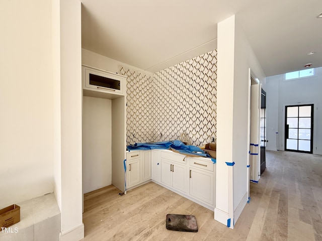 bathroom with hardwood / wood-style flooring