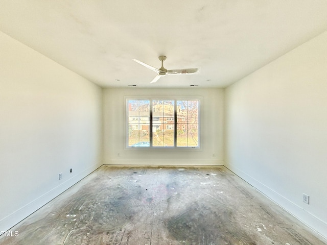 spare room with ceiling fan