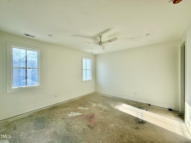 spare room with ceiling fan