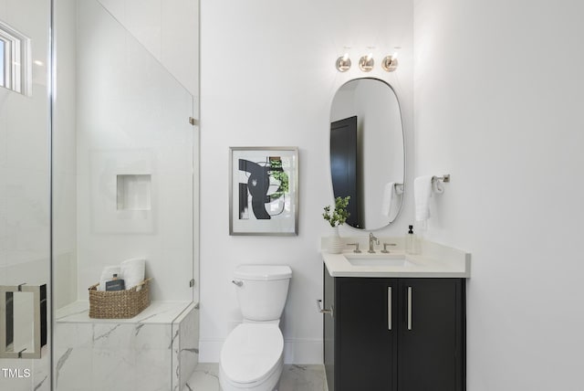 712 Daniels St, Raleigh, NC 27605 - bathroom featuring vanity, marble finish floor, a shower, baseboards, and toilet