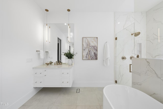 712 Daniels St, Raleigh, NC 27605 - full bath featuring a freestanding tub, baseboards, a marble finish shower, and vanity