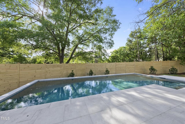 712 Daniels St, Raleigh, NC 27605 - view of pool featuring a fenced backyard, a patio, and a fenced in pool