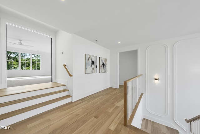 712 Daniels St, Raleigh, NC 27605 - stairway featuring recessed lighting, wood finished floors, ceiling fan, baseboards, and visible vents