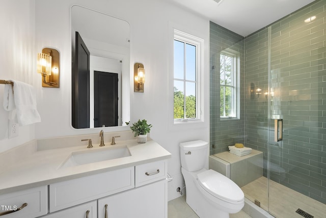 712 Daniels St, Raleigh, NC 27605 - full bath featuring a shower stall, visible vents, toilet, and vanity