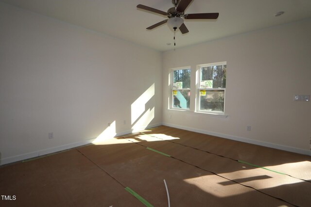 unfurnished room with ceiling fan