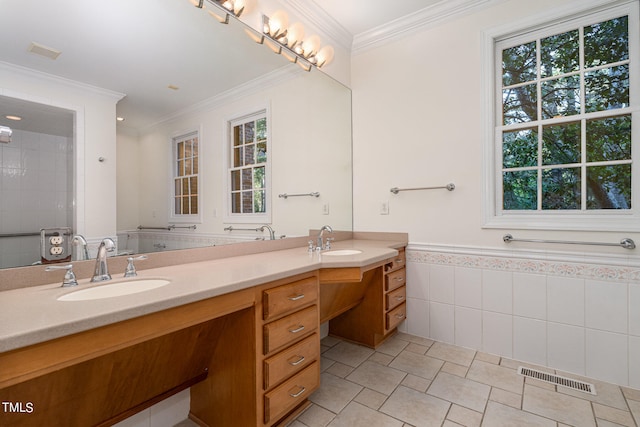 bathroom featuring vanity, ornamental molding, and tile patterned flooring