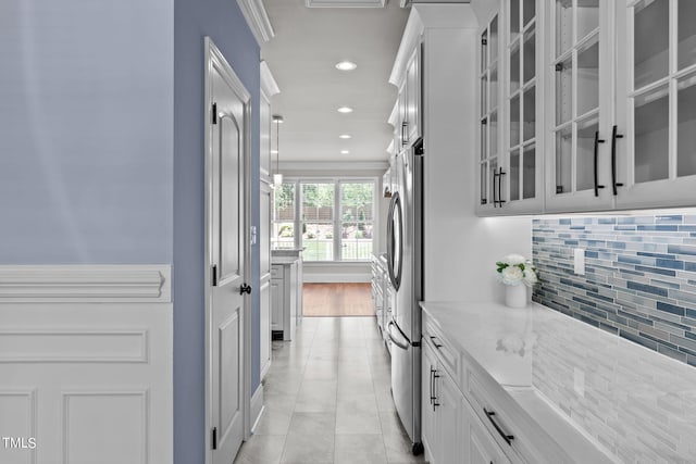 interior space featuring light tile patterned floors