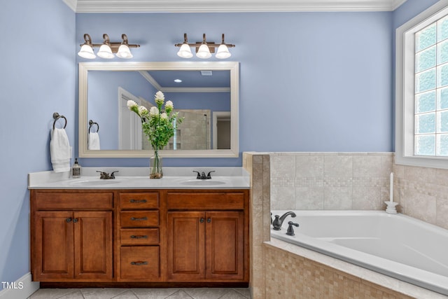 bathroom featuring tile patterned flooring, vanity, and crown molding