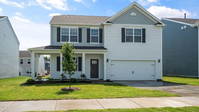 view of front facade featuring a garage and a front lawn