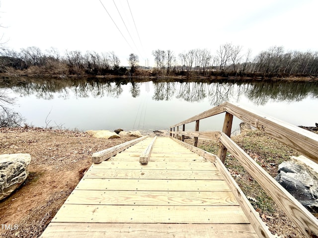 view of dock with a water view