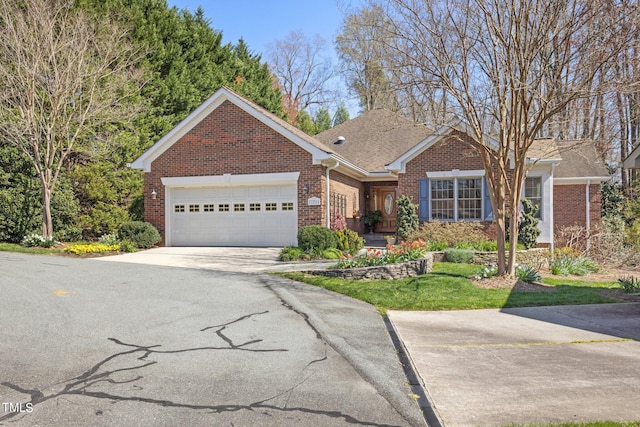 ranch-style home featuring a garage