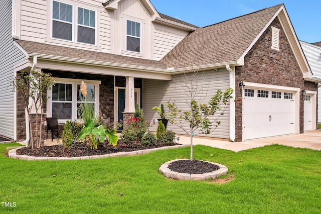 craftsman-style house featuring a front yard