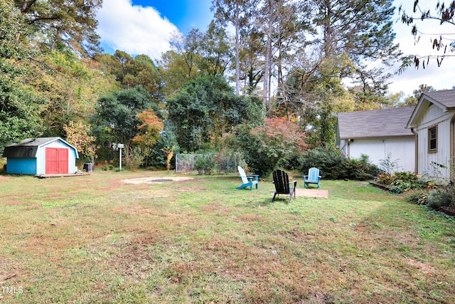 view of yard with a storage unit