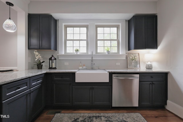 kitchen featuring light stone counters, stainless steel dishwasher, dark hardwood / wood-style floors, pendant lighting, and sink