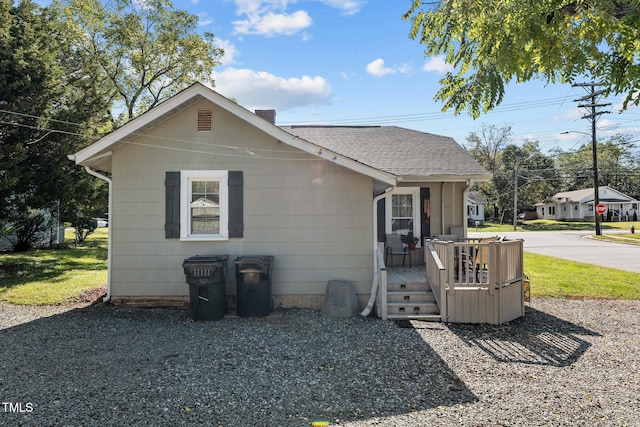 view of front of house with a deck