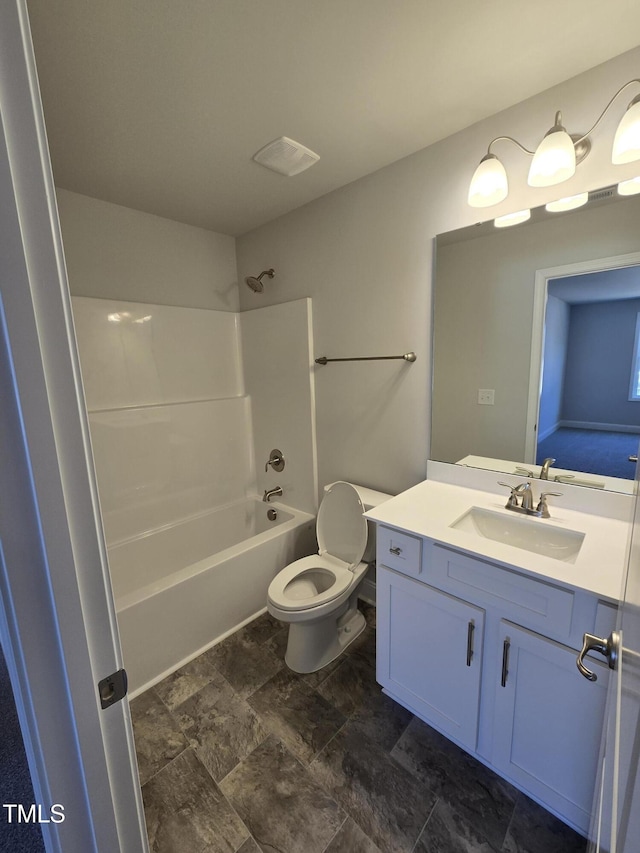 full bath with toilet, visible vents, washtub / shower combination, and vanity