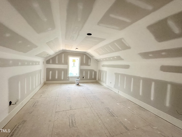 7000 N Ridge Dr, Raleigh, NC 27615 - additional living space featuring vaulted ceiling