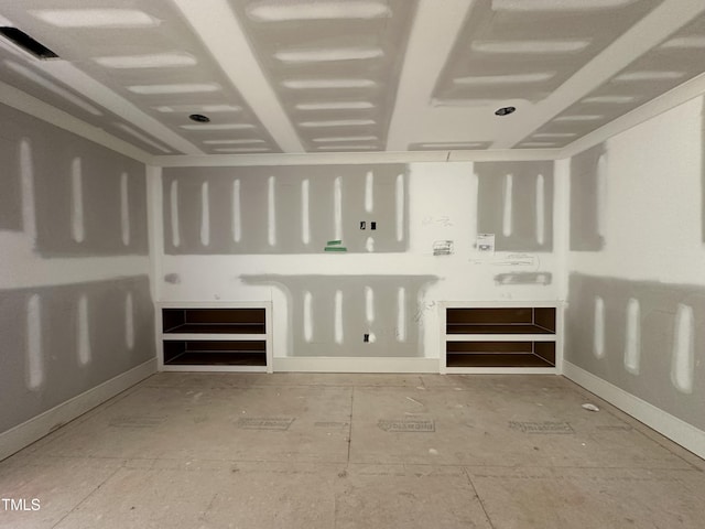 7000 N Ridge Dr, Raleigh, NC 27615 - unfurnished living room with baseboards