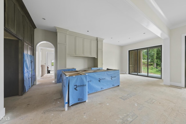 7000 N Ridge Dr, Raleigh, NC 27615 - kitchen with arched walkways and a kitchen island