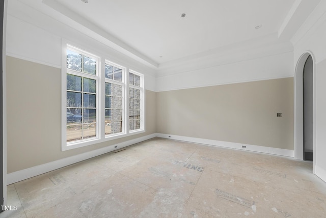 7000 N Ridge Dr, Raleigh, NC 27615 - additional living space featuring arched walkways and baseboards