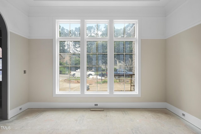 7000 N Ridge Dr, Raleigh, NC 27615 - empty room with arched walkways and healthy amount of natural light