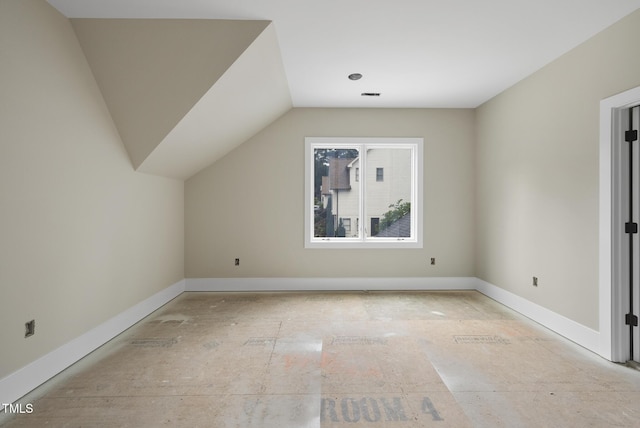 7000 N Ridge Dr, Raleigh, NC 27615 - bonus room featuring baseboards and vaulted ceiling