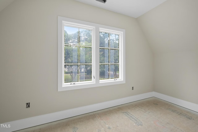 7000 N Ridge Dr, Raleigh, NC 27615 - additional living space featuring baseboards and lofted ceiling