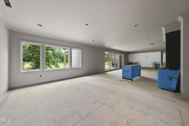 7000 N Ridge Dr, Raleigh, NC 27615 - unfurnished living room with ornamental molding and baseboards