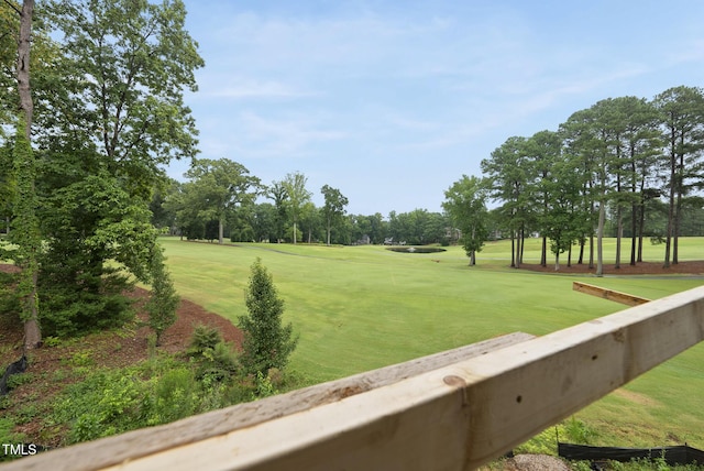 7000 N Ridge Dr, Raleigh, NC 27615 - view of home's community featuring view of wooded area, golf course view, and a lawn