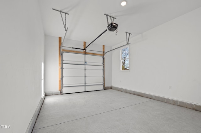 garage featuring a garage door opener