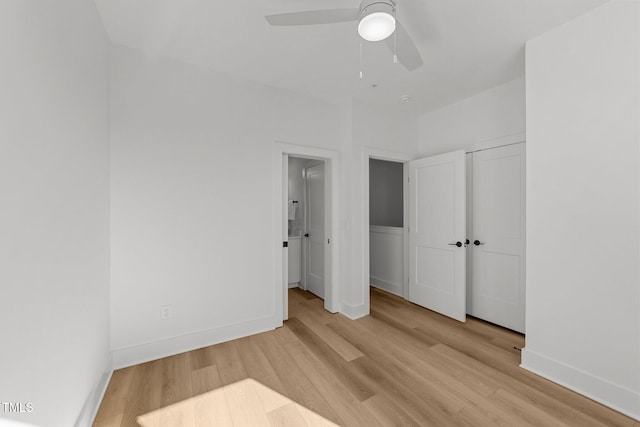 unfurnished bedroom with ceiling fan, a closet, and light hardwood / wood-style floors