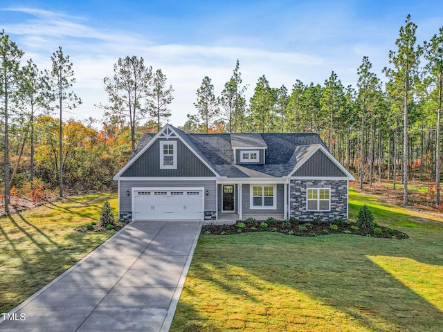 craftsman-style home featuring a front yard and a garage