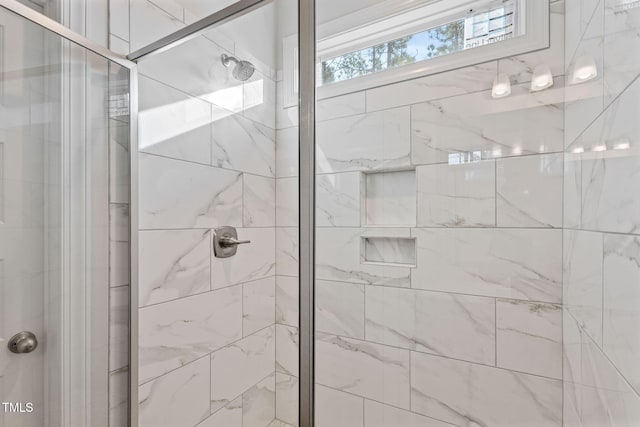 bathroom with an enclosed shower