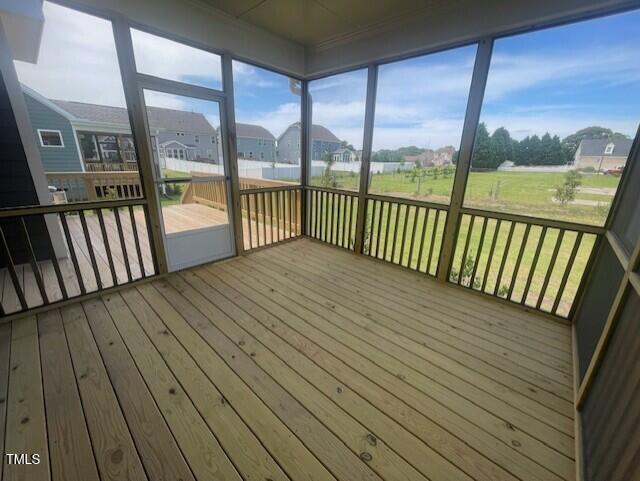 1528 Maelyn Way, Fuquay Varina, NC 27526 - unfurnished sunroom featuring a residential view