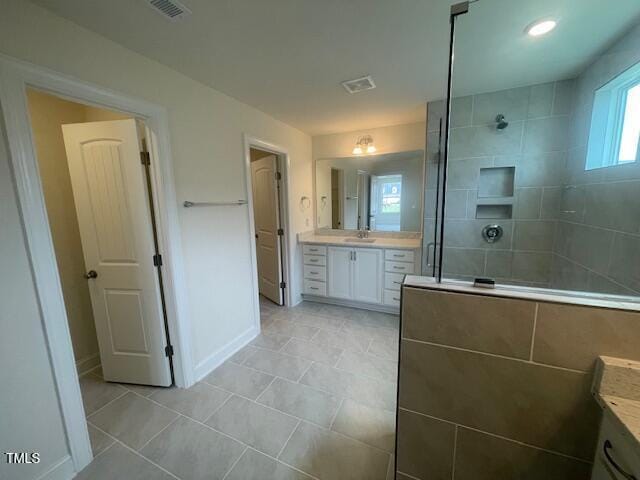 1528 Maelyn Way, Fuquay Varina, NC 27526 - full bath featuring vanity, a walk in shower, tile patterned flooring, and baseboards