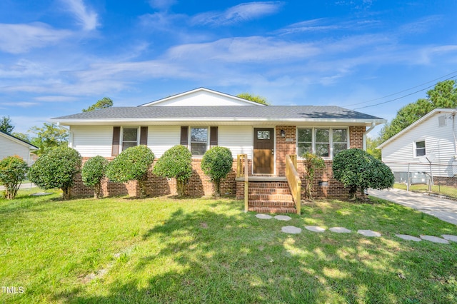 view of front facade with a front lawn