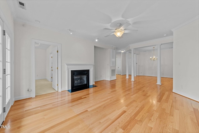 unfurnished living room with ceiling fan with notable chandelier, light wood-type flooring, and crown molding