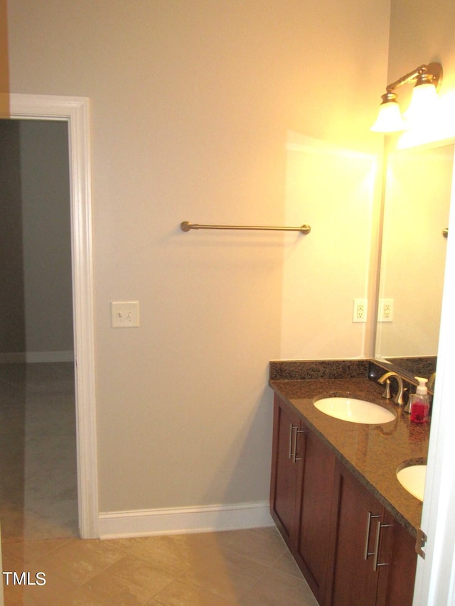 bathroom with vanity and tile patterned floors