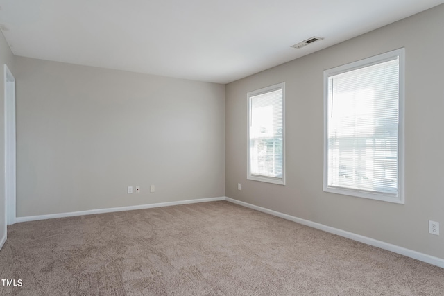 view of carpeted spare room