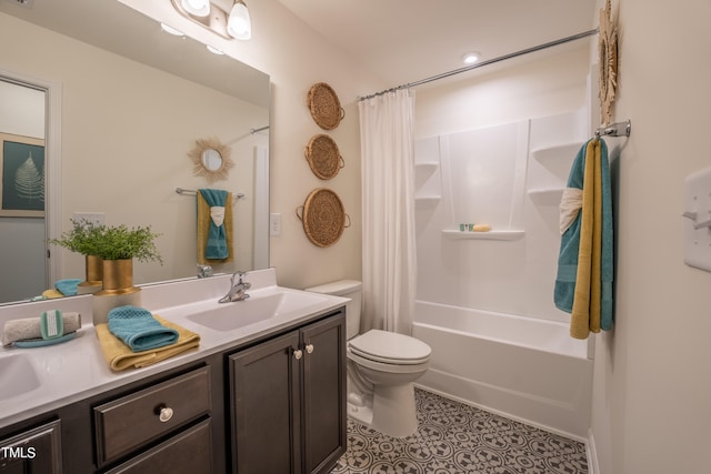 full bathroom with vanity, toilet, and shower / bath combo with shower curtain