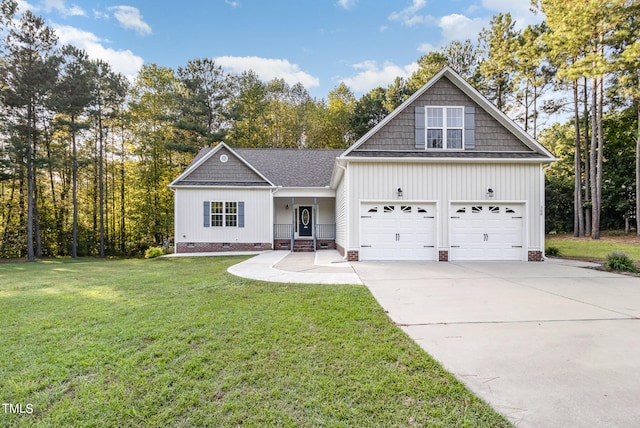 craftsman-style home with a garage and a front lawn