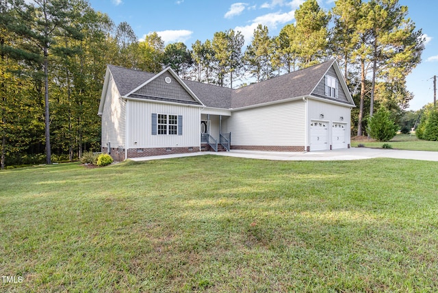 view of front facade featuring a front lawn and a garage