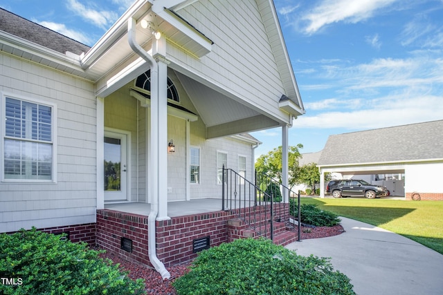 entrance to property with a carport