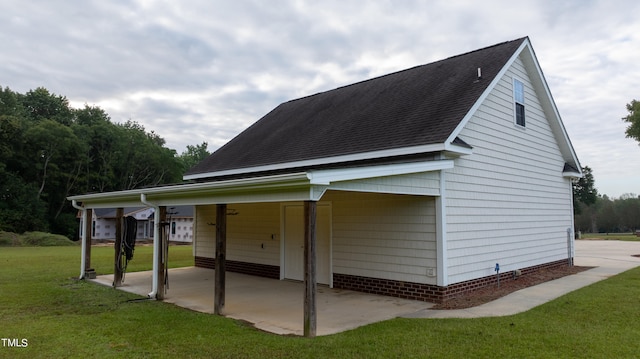 view of property exterior with a yard