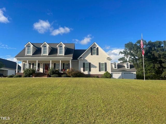 cape cod home featuring a front yard and a porch